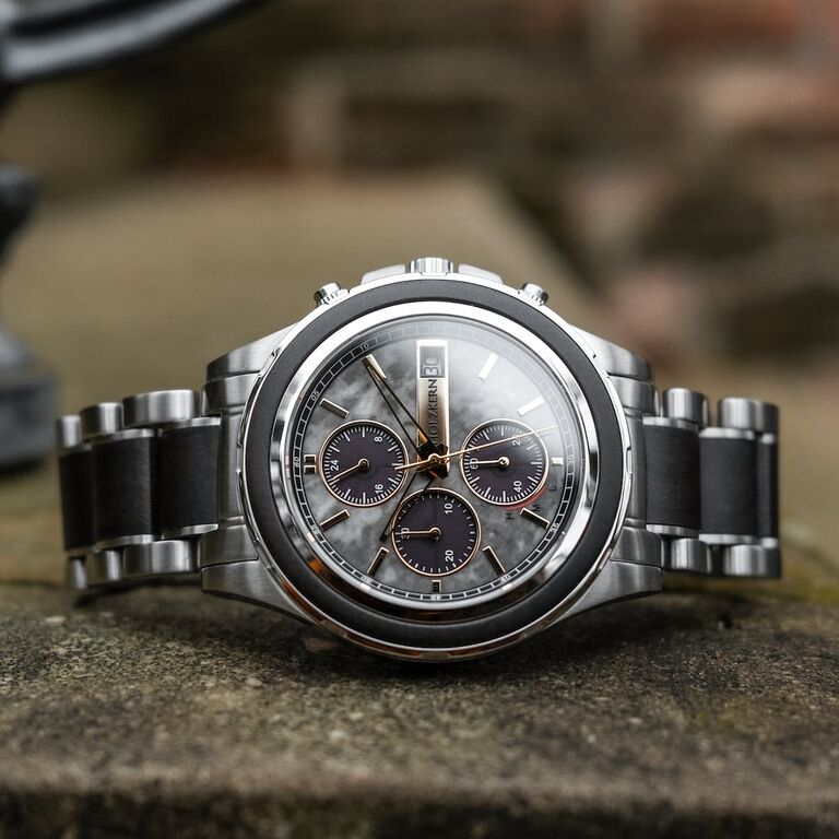 "Cairo" watch featuring a refined marble and maple design with a sleek, modern style.
