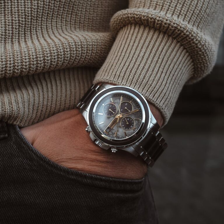 "Cairo" watch featuring a sleek metal band and elegant marble dial, exuding modern sophistication.